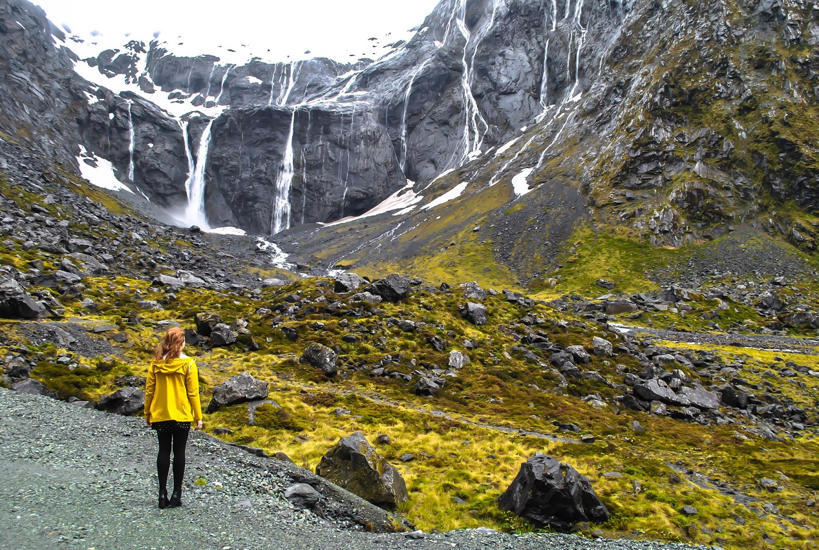 Watching waterfalls at the Fjordland National Park on the Southern Explorer Topdeck tour.