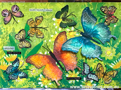 butterflies art journal page using stamps and other mixed media craft supplies