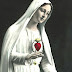 OUR LADY OF FATIMA AND THE WOMAN CLOTHED WITH THE SUN OF REVELATION 12