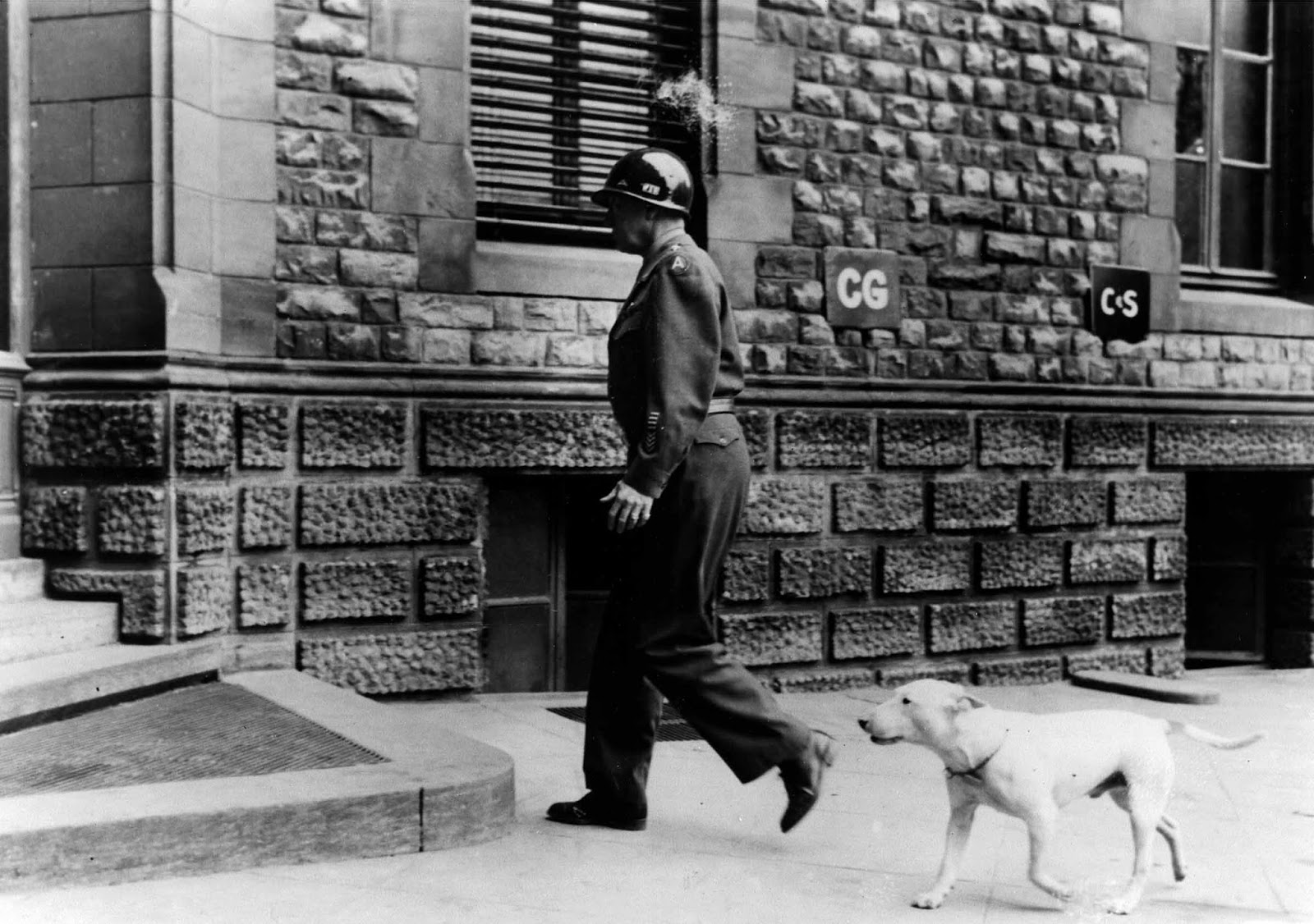 Willie following Patton as he enters his Headquarters at Luxembourg.