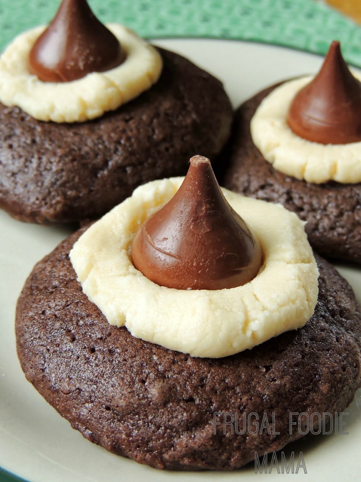These thick, chewy cookies start with a brownie mix and end with a fudgy Bailey's spiked center & are topped with a classic Hershey's Kiss.