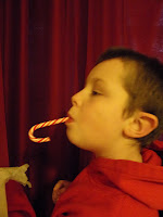 boy sucking candy cane
