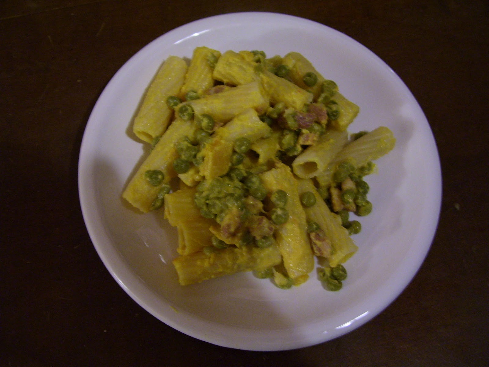Ricette di una volta Rigatoni piselli, zucca e pancetta