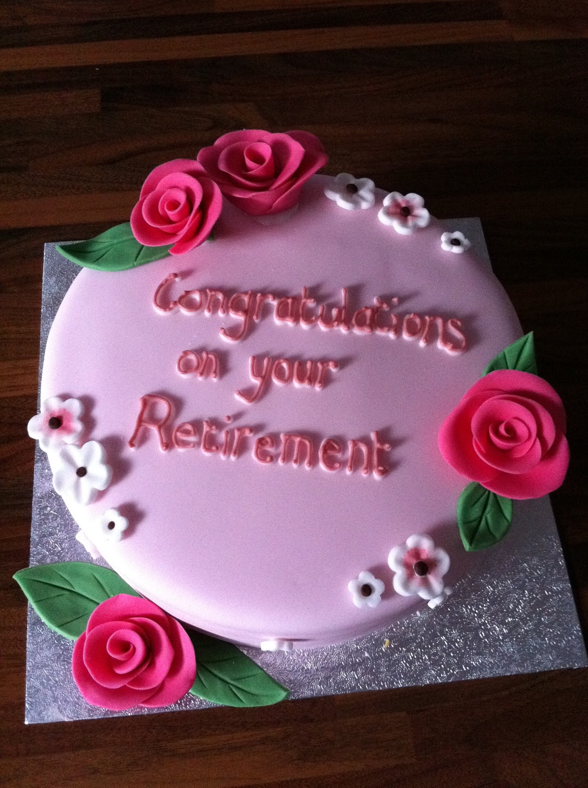 Caked in Icing Flower Retirement Cake