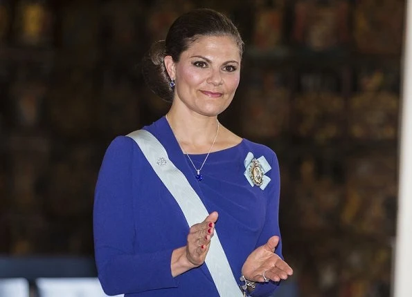 Crown Princess Victoria wore ESCADA Dress and carried Nancy Gonzalez Silver Metallic Clutch