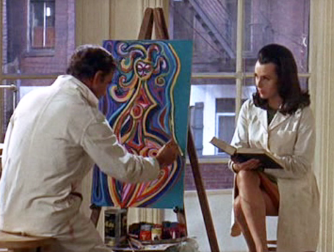 Charly Gordon (Cliff Robertson) pinta mientras Alice Kinnian (Claire Bloom) le alecciona en Charly - Cine de Escritor