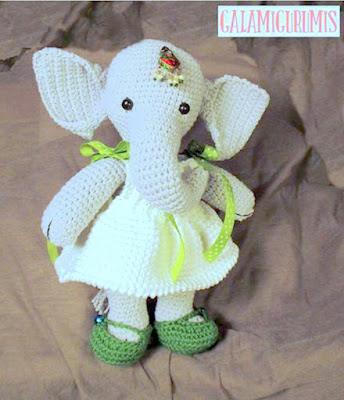 Crochet amigurumi elephant girl with dress and shoes