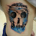 Awesome creative skull tattoo on side body 