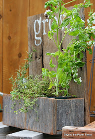 grow planter made with reclaimed barn wood http://bec4-beyondthepicketfence.blogspot.com/2014/05/grow-rustic-wood-planter.html