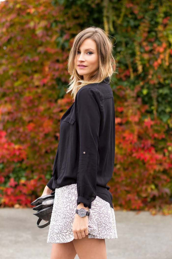Vancouver Fashion Blogger, Alison Hutchisnon, is wearing a Zara black wrap top, Topshop skater skirt in animal print, a j.crew necklace, and zara pumps in burgundy