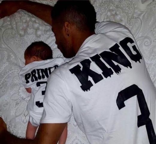Photo: Former ChelseaFC star Ashley Cole cuddles his new born son