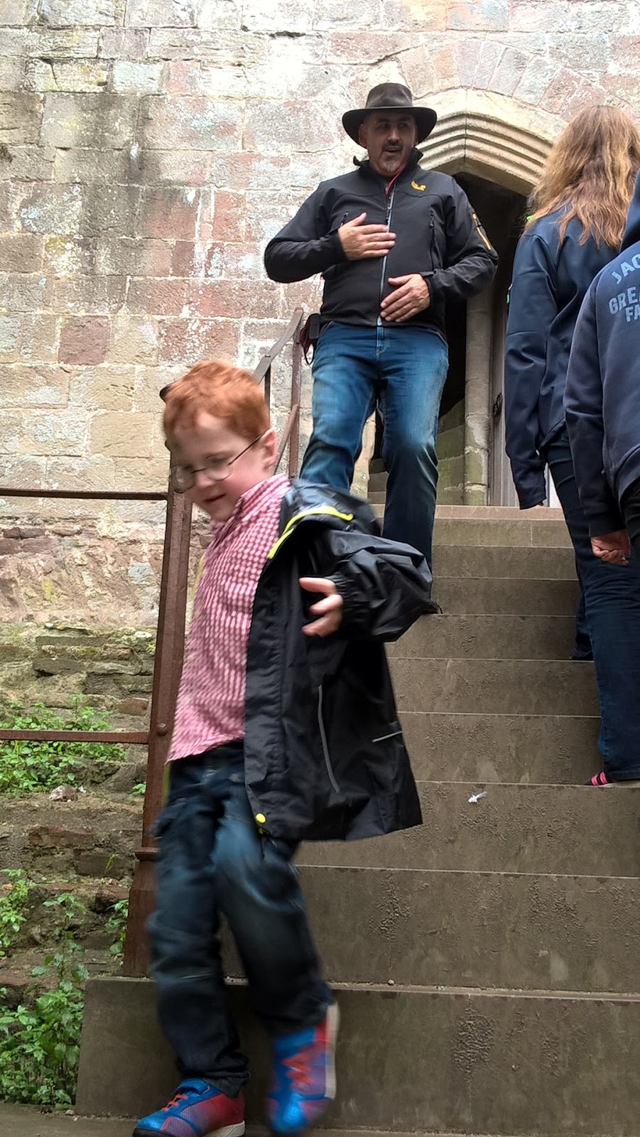 Anil Nayar and Ieuan Hobbis descending steps at Raglan Castle