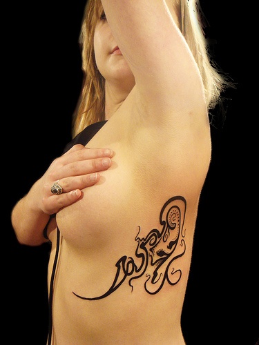 Side Tribal Tattoo For Women