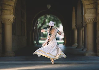new dehili woman dancing with flowing dress on 
