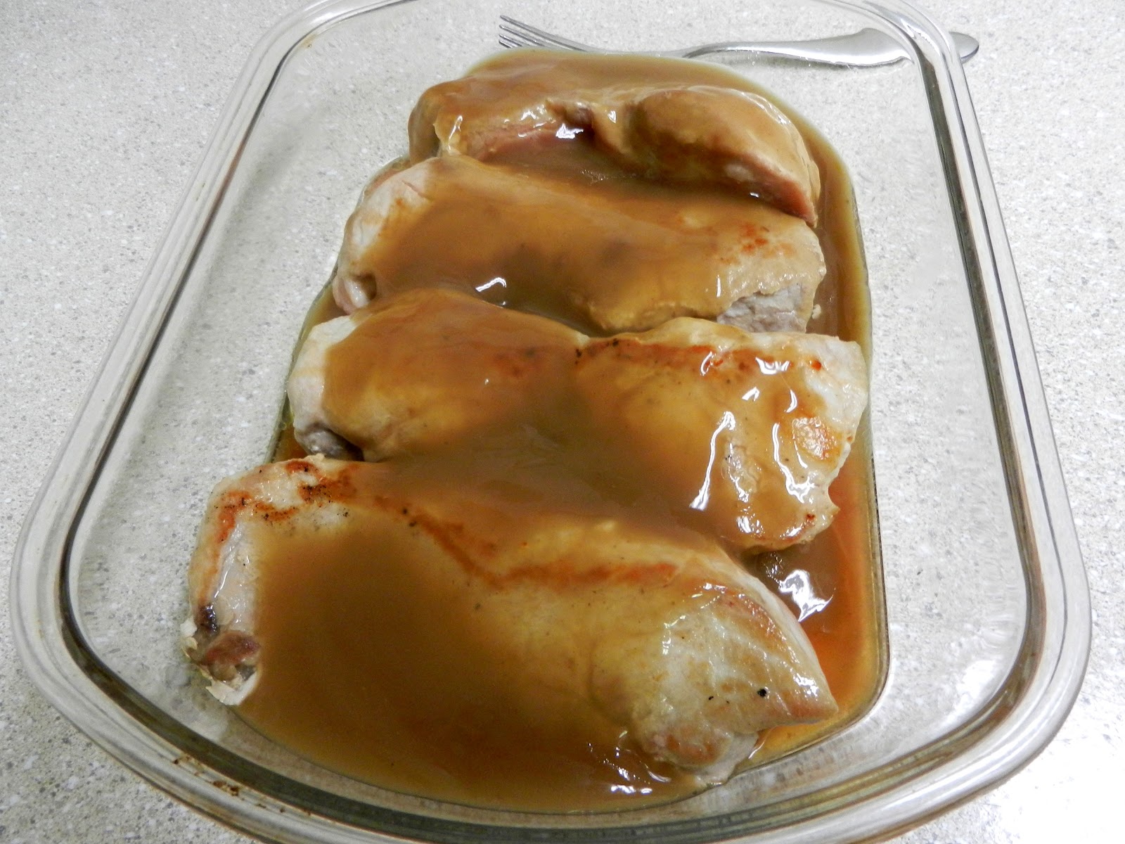 Feasts and Fiction Gravy Pork Chops with Stuffing Biscuits