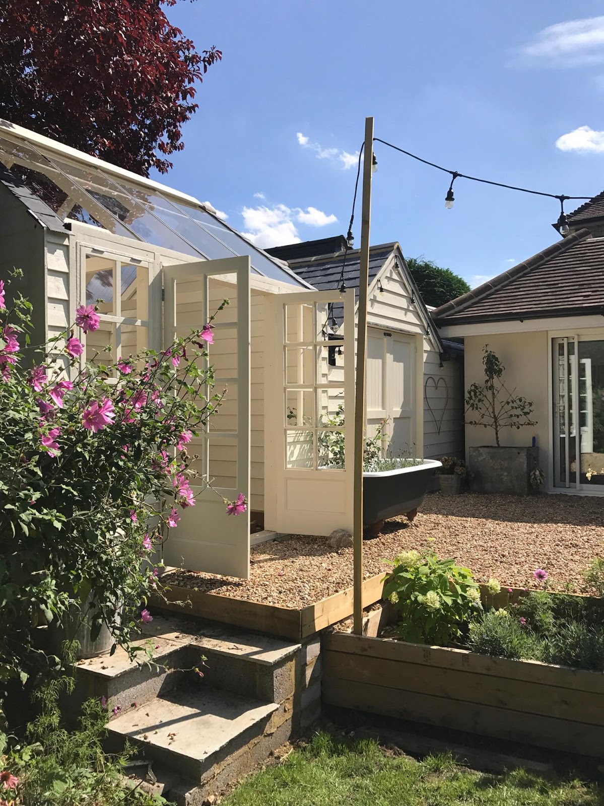 Garden // Landscaping our patio and building a greenhouse & garage