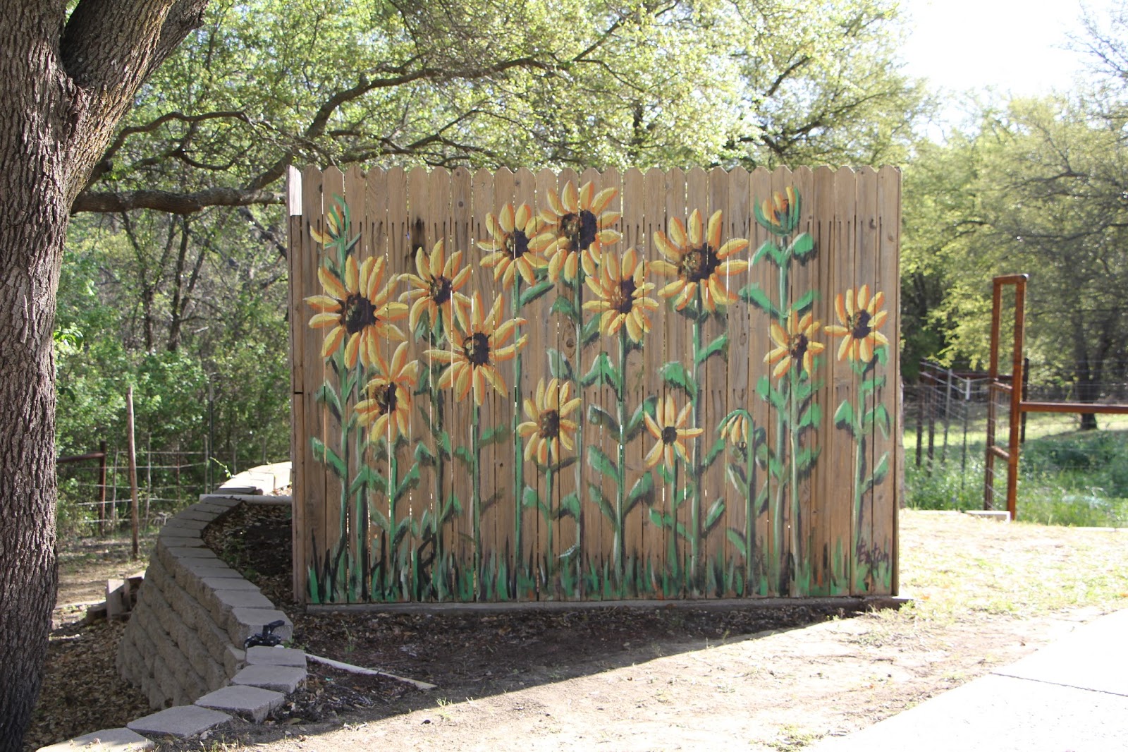 Word Weaver Art Sunflower Mural on Fence