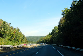 Views while driving on Interstate 90 in Massachusetts in the fall