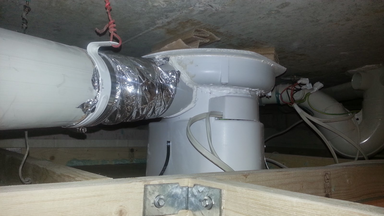 Savvy Spex: DIY Vent Fan Exhaust Duct in Small Bathroom