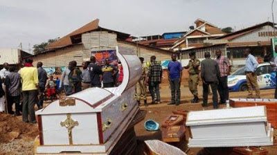 Synagogue Church Of All Nations Uganda | police stranded as angry traders dump 37 coffins at a Synagogue Church Of All Nations Uganda | police stranded as angry traders dump 37 coffins at a