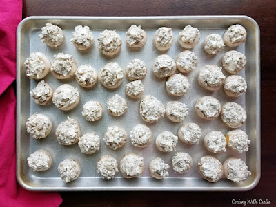 tray filled with sausage and cream cheese stuffed mushrooms