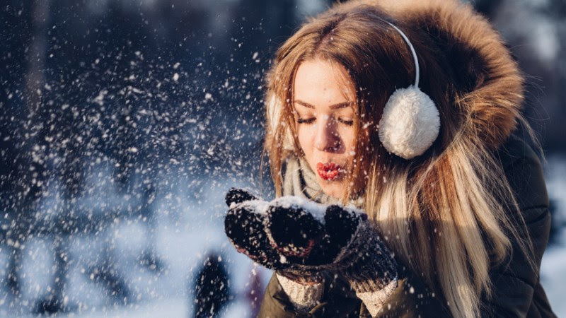 Beautiful Girl in Winter Landscape