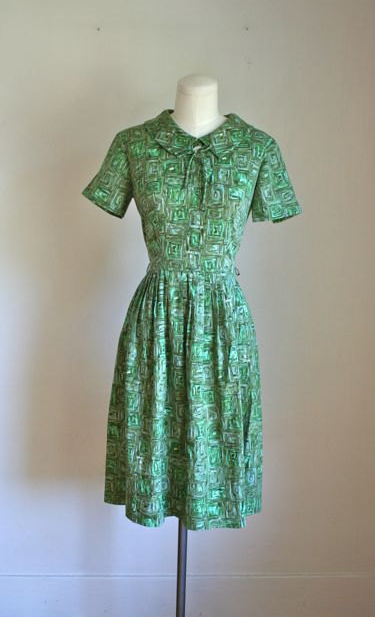 vintage 60s abstract print green dress with short sleeves and peter pan collar with bow