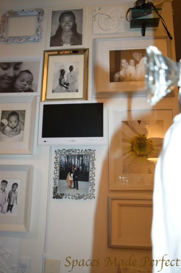 How to steps to create  portrait wall with White LED TV,chic faux fur storage ottoman, mirrored frames.