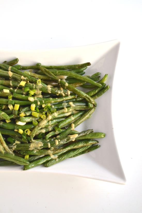 Roasted Dijon Green Beans are full of flavor, easy to make and the perfect healthy side dish for any meal. www.nutritionistreviews.com