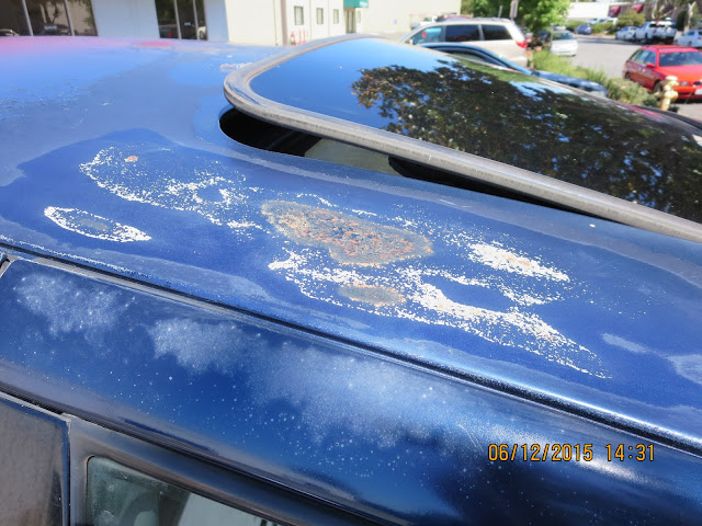 Peeling paint & rust on 2003 Chrysler PT Cruiser before repairs at Almost Everything Auto Body.