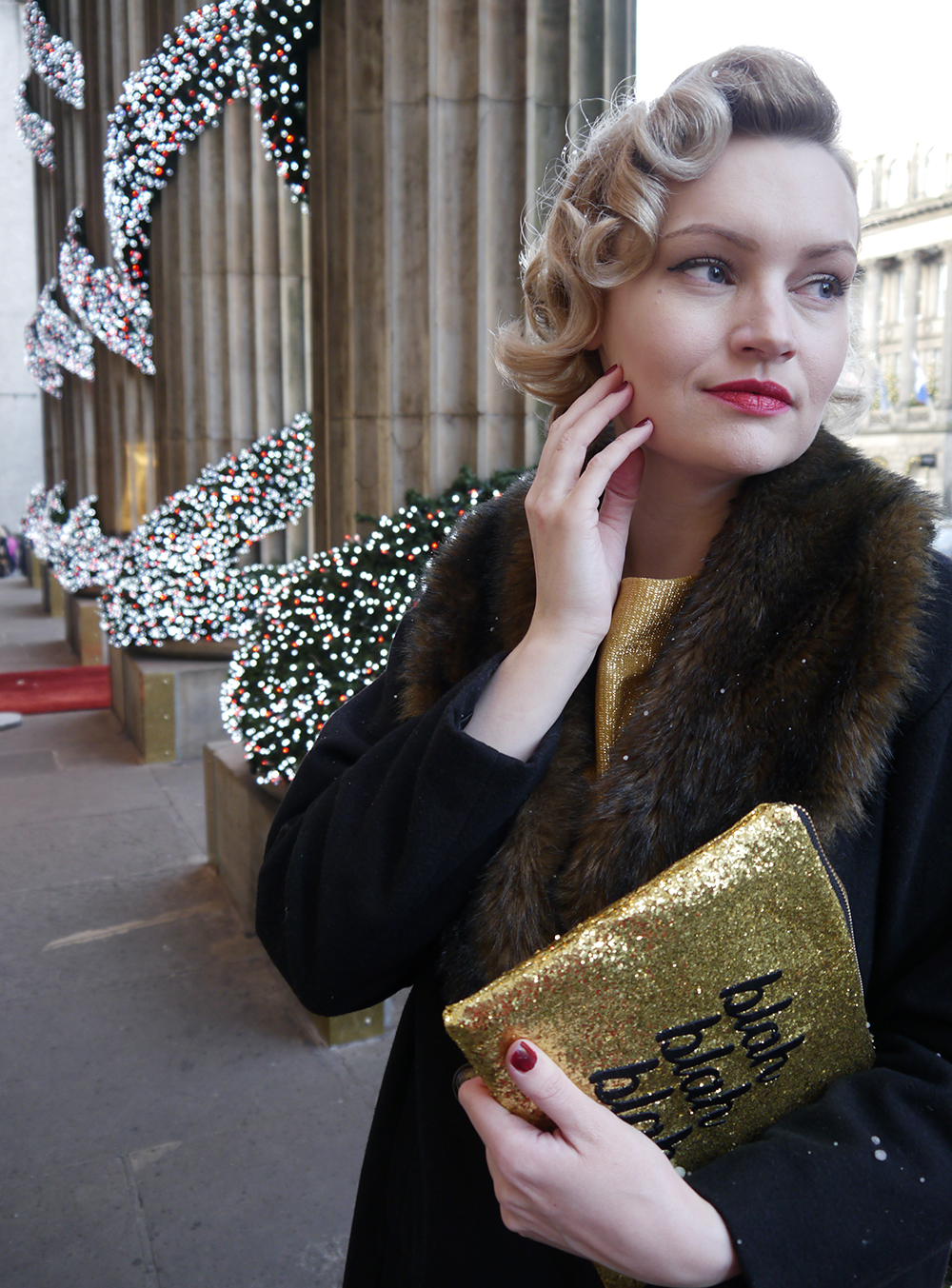 Vintage Christmas partyoutfit inspiration British vintage style blogger, faux fur trimmed Henry Holland coat, gold glitter clutch for christmas party, easy vintage pincurl style with tongs, fashion blogger christmas outfit, the dome edinburgh christmas