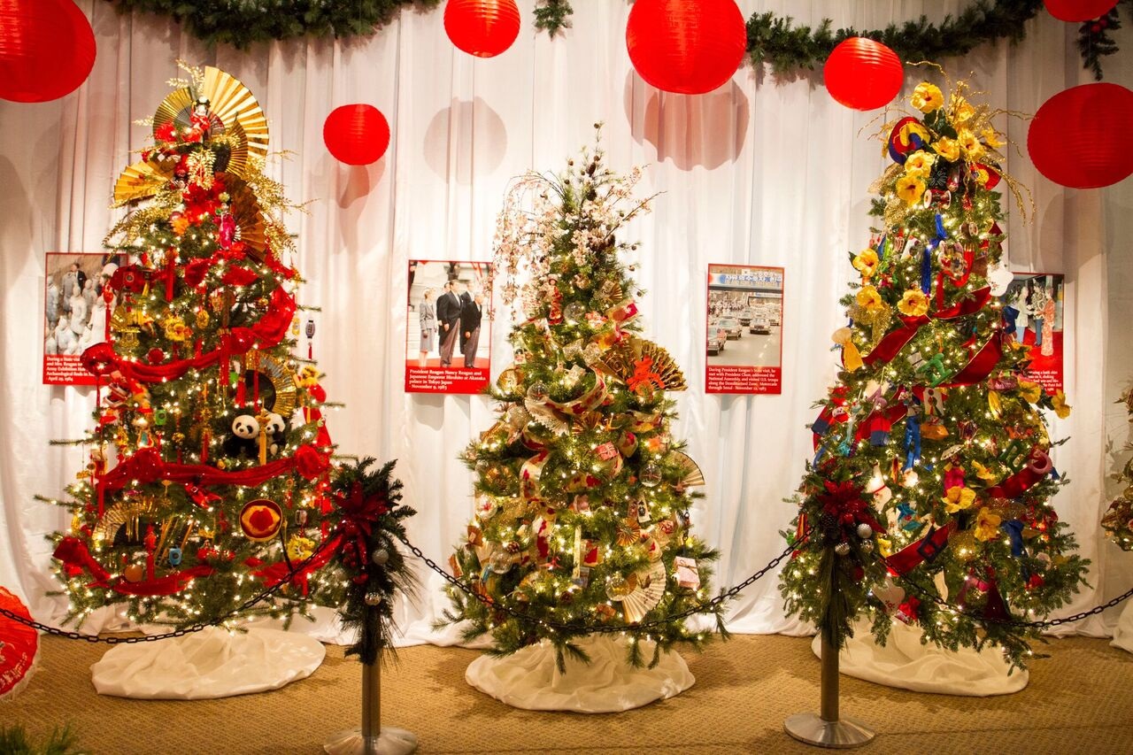 the featured tree is an elegant reproduction of president and mrs reagans white house tree complete with reagan red decorations and dozens of hand blown - Library Christmas Decorations the featured tree is an elegant reproduction of president and mrs reagans white house tree complete with reagan red decorations and dozens of hand blown - Library Christmas Decorations