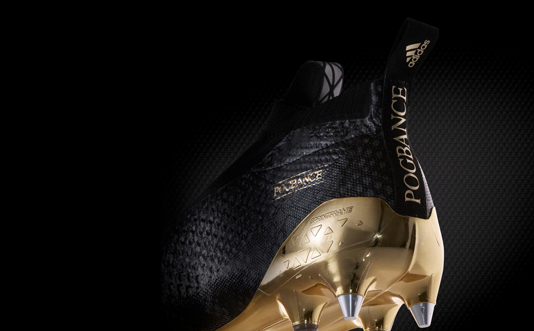 pogba boots black and gold