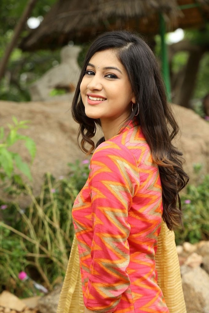 Glamours Hindi Girl Simran Sharma Photo shoot In Orange Dress