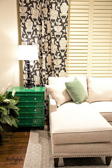 Big Burst Of Color At High Point Market green lacquered cabinet