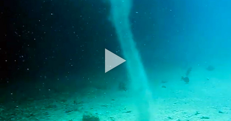 Underwater tornado caught upfront and personal by a Scuba Diver