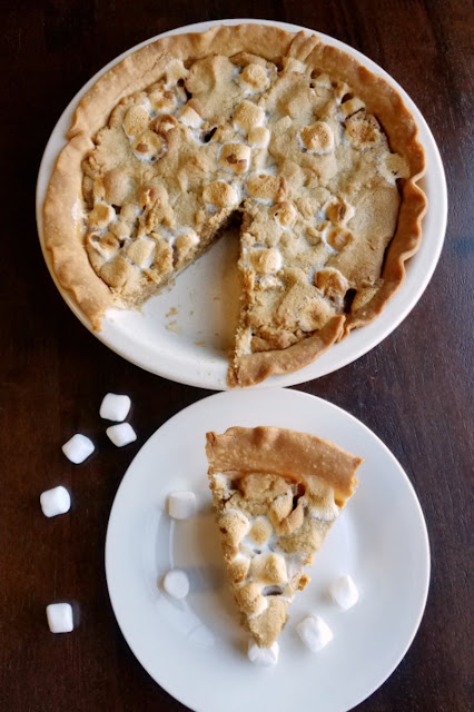 It's a peanut butter cookie loaded with mini marshmallows and baked in a pie crust! It is like my childhood dreams in pie form! It's a peanut butter cookie loaded with mini marshmallows and baked in a pie crust! It is like my childhood dreams in pie form!