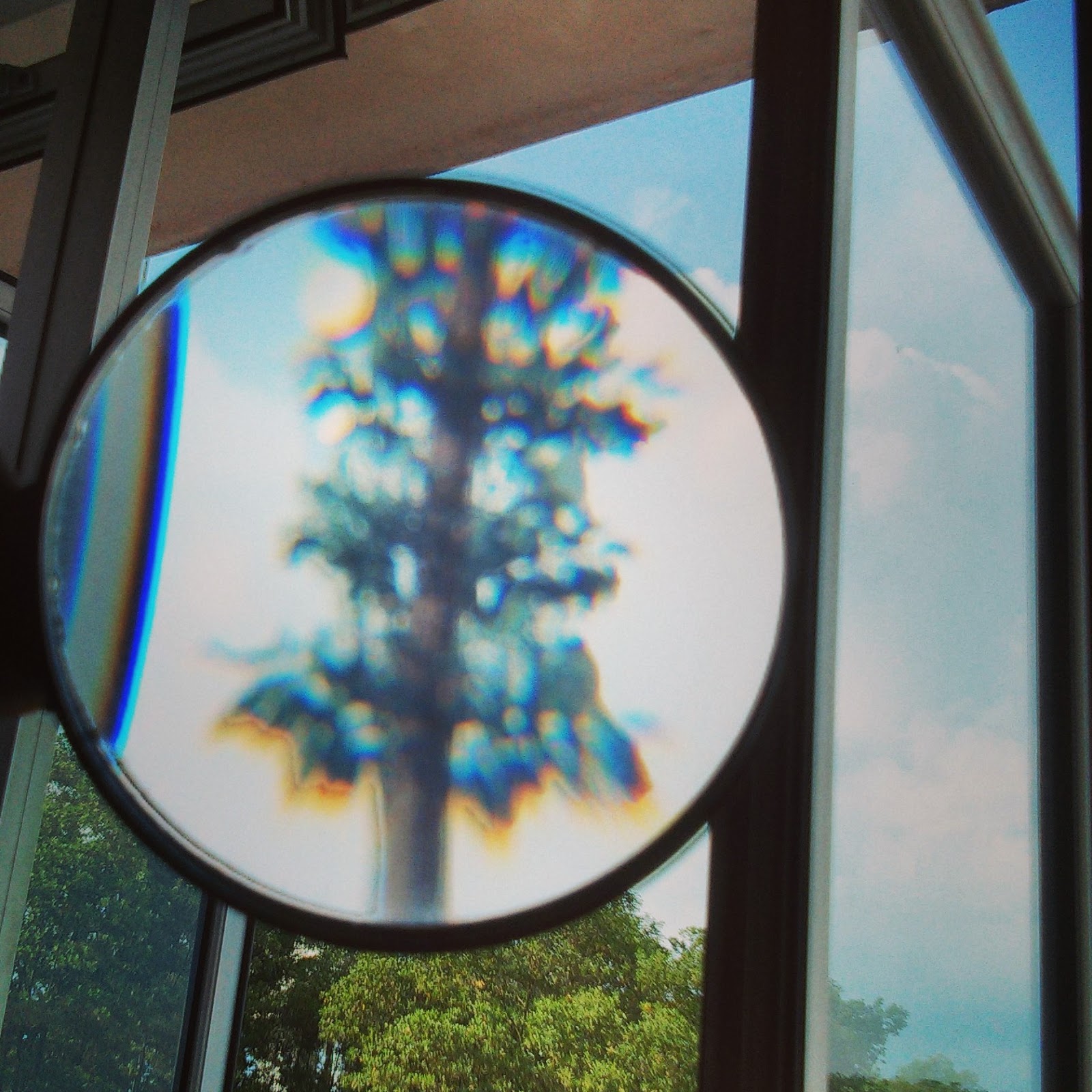 My Σlegant Universe Internal Reflection of Magnifying Glass