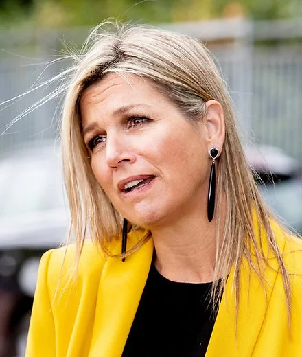 Queen Maxima wore a Zara yellow double-breasted blazer and Zara yellow trousers