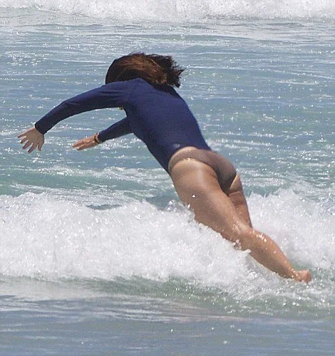 Crown Princess Mary was pictured in the surf with her husband Crown Prince Frederik and their children Prince Christian, Princess Isabella and Princess Josephine.