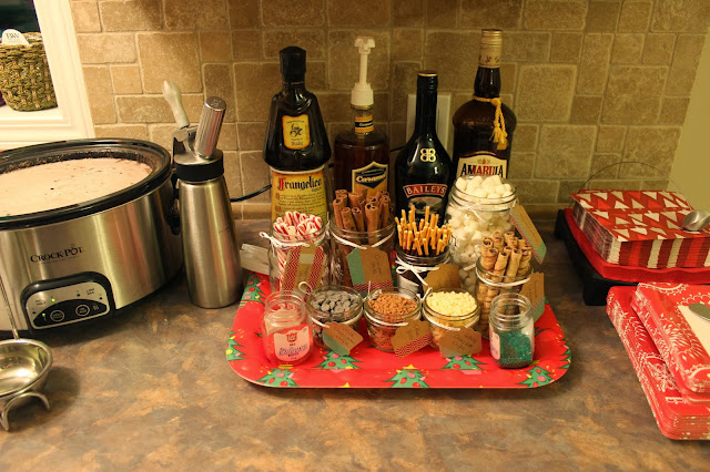 This hot chocolate bar is perfect for a holiday party! All the elements to make and dress your very own delicious cup of hot chocolate