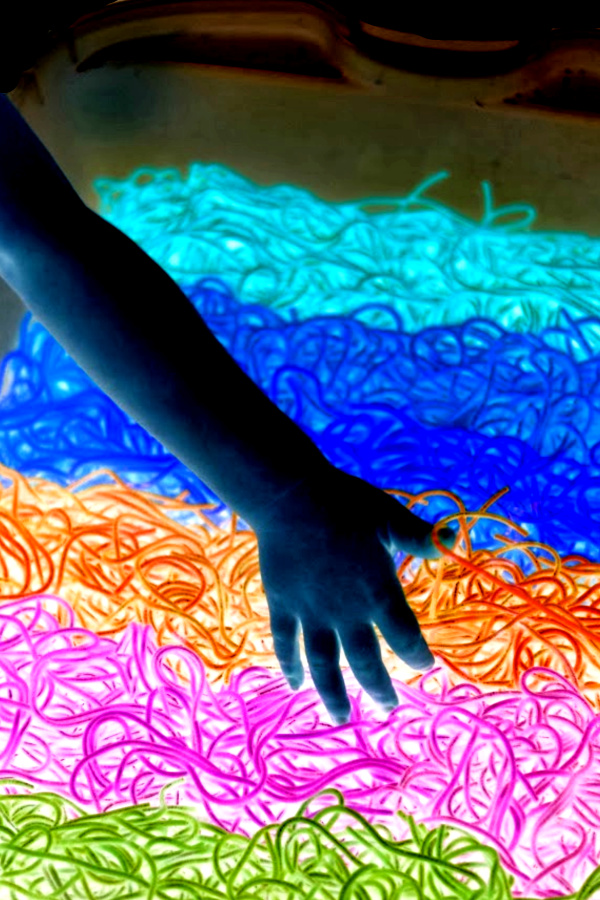 Make glowing rainbow noodles for kids using this easy recipe tutorial!  Dyed noodles are great for arts, crafts, and sensory play activities. #glowingsensorybin #glowingrainbownoodles #rainbowdyednoodles #rainbownoodles #rainbowspaghetti #sensoryactivities #sensorybins #coloredpasta #howtodyenoodles #growingajeweledrose