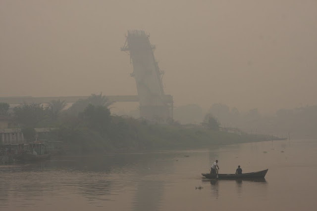 BERITA FOTO;Kota Pekanbaru,dulu dan kini saat diselimuti kabut asap <img src="Kota Pekanbaru.jpg" alt=" BERITA FOTO;Kota Pekanbaru,dulu dan kini saat diselimuti kabut asap">