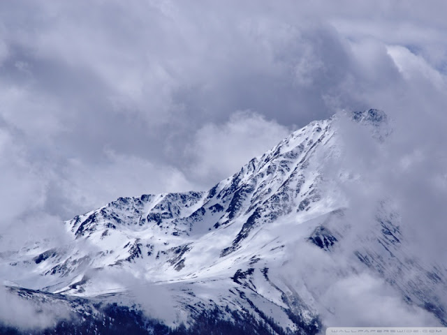 mountain peak with drifting clouds wallpaper mountain peak with drifting clouds wallpaper