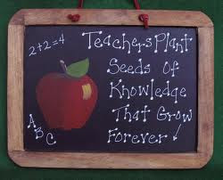mini chalkboard that says teachers plant seeds of knowledge that grow forever