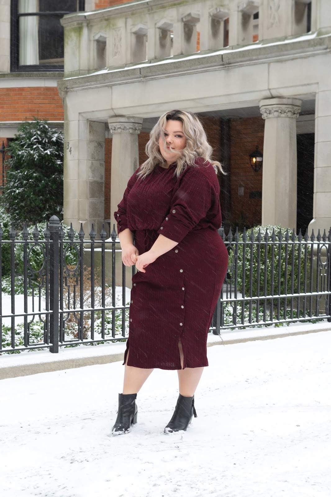 Chicago Plus Size Petite Fashion Blogger, youtuber, and model Natalie Craig, of Natalie in the City, reviews Soncy's Ruby Red Midi Skirt and Cropped Top.