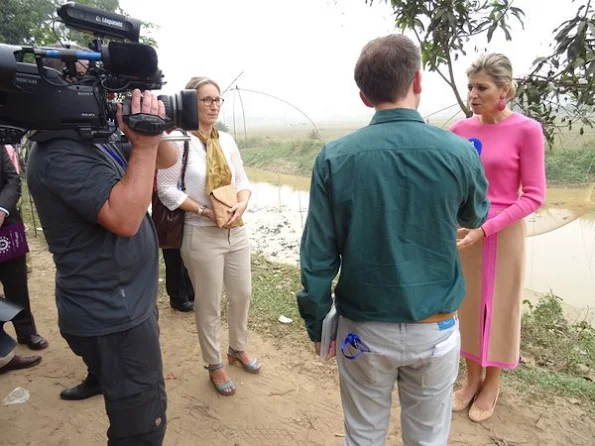 Queen Máxima of The Netherlands visits outside Dhaka the Viyellatex garment factory Viyellatex where she speaks including with the business owners and employees about their experience with loans and other (digital) financial services