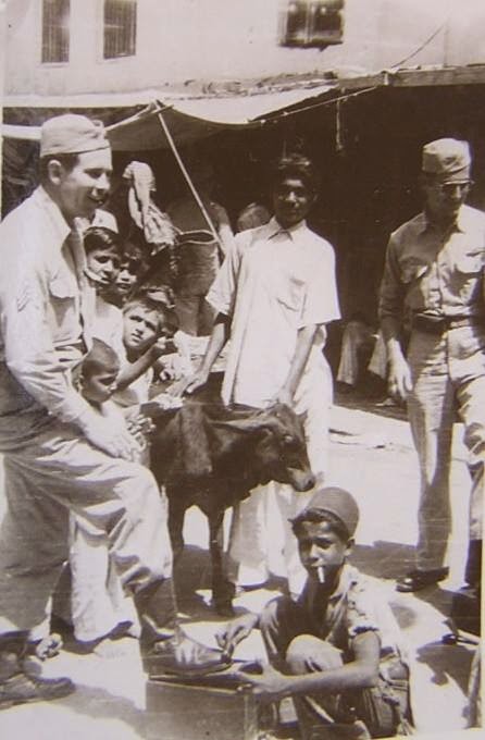 Boy Polishing Boot of an European Man - Karachi c1940's