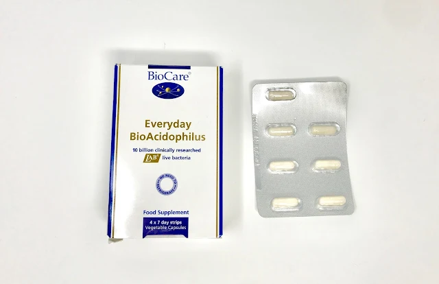 A packet of the BioCare Everyday BioAcidophilus next to one of the sheets with 7 capsules in