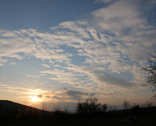 The sun sinks towards the horizon The sun sinks towards the horizon